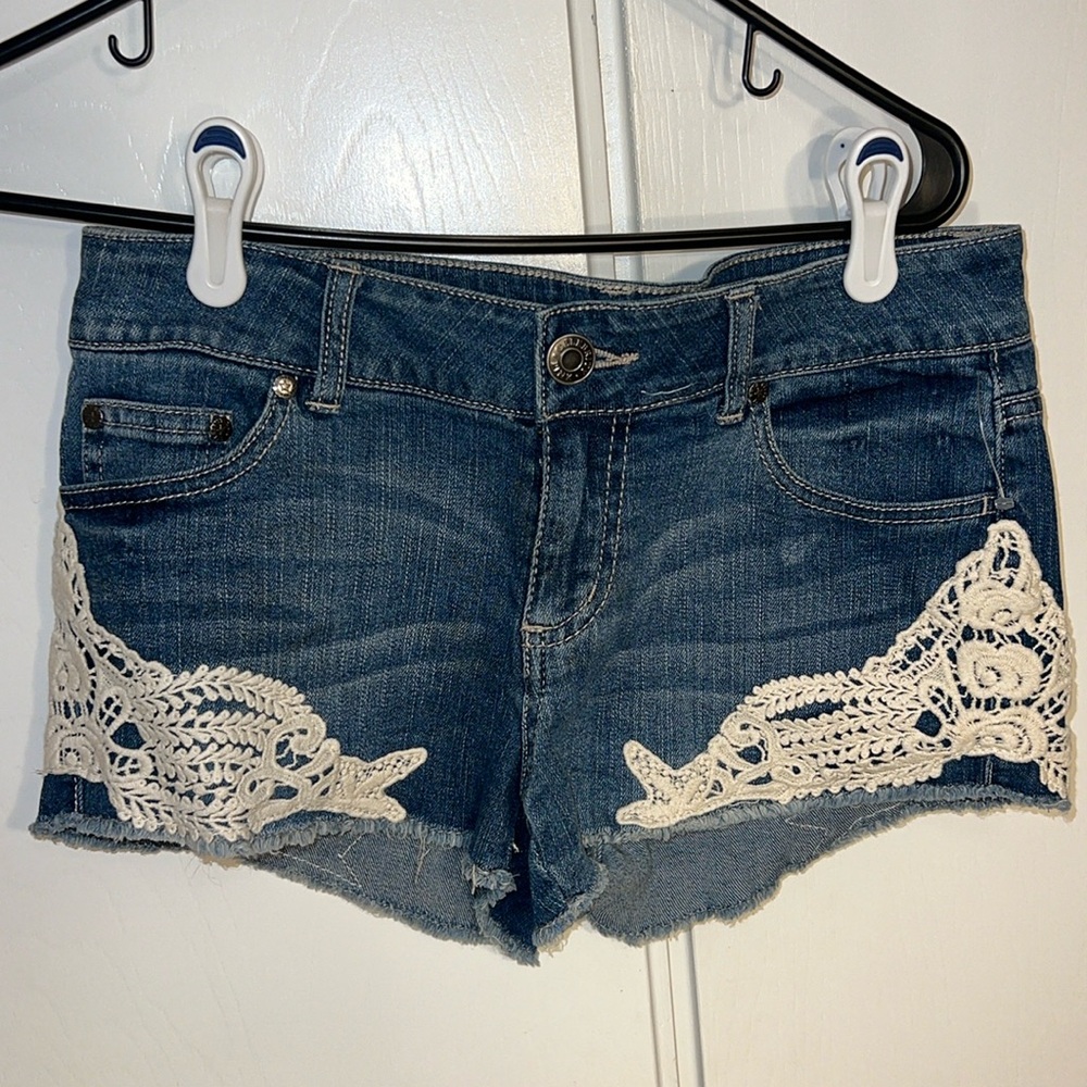 Crochet embellished denim shorts